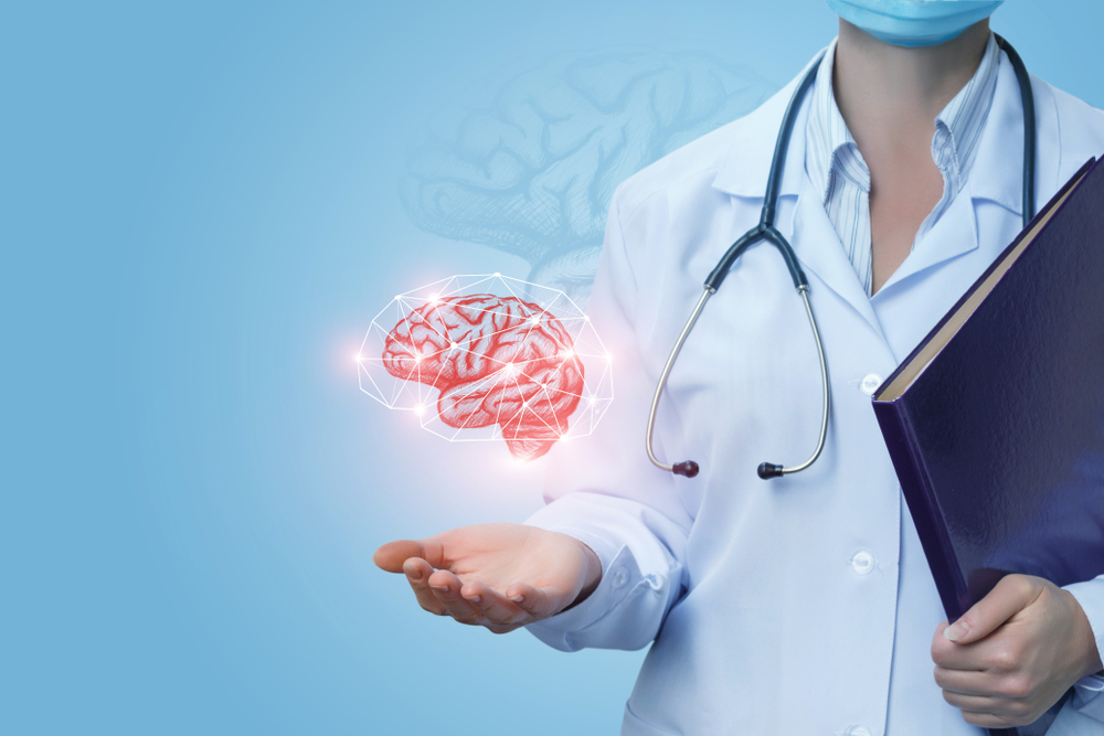 doctor with icon of brain hovering above open palm